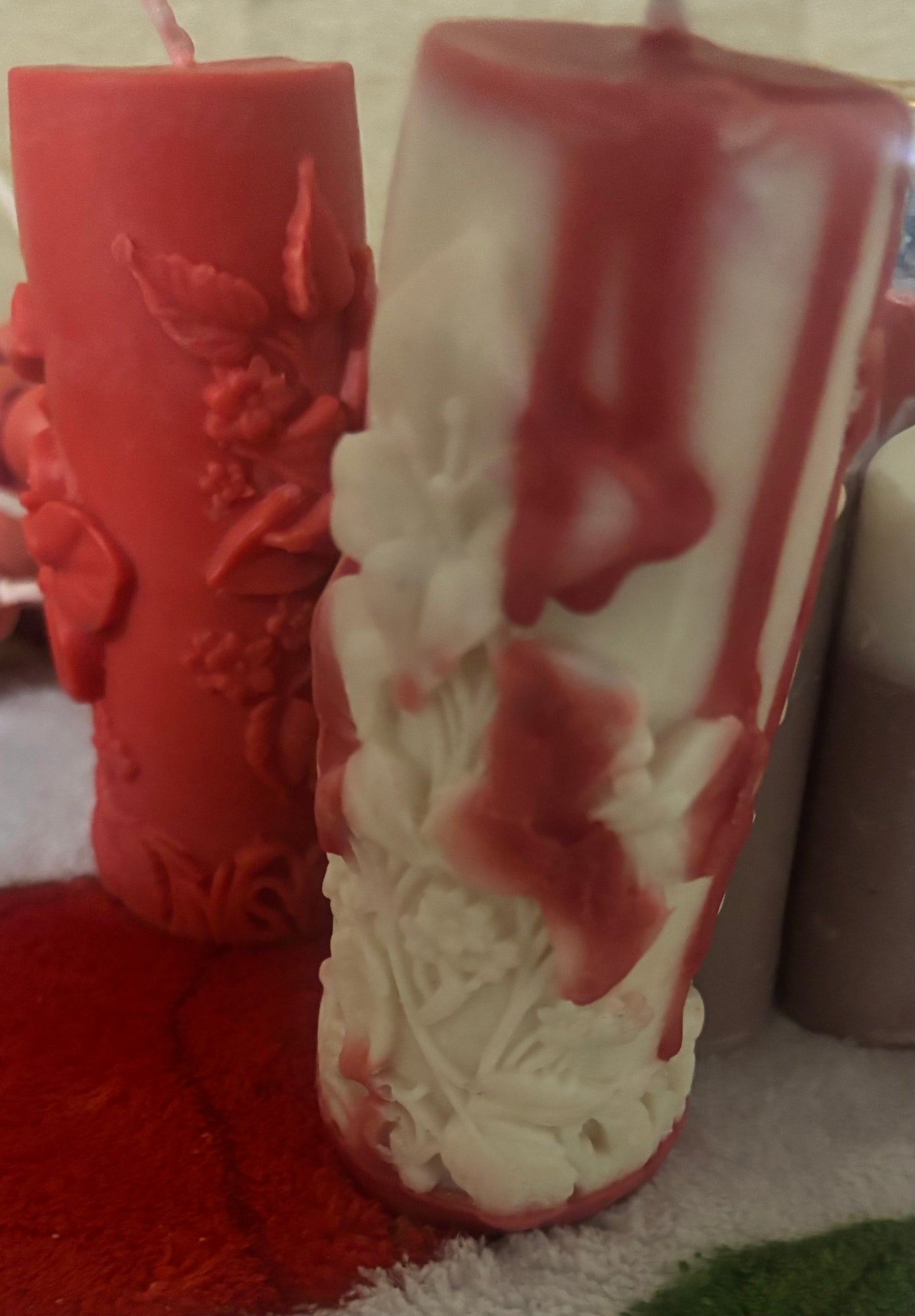 Elegant cylinder shaped candle wrapped with flowers